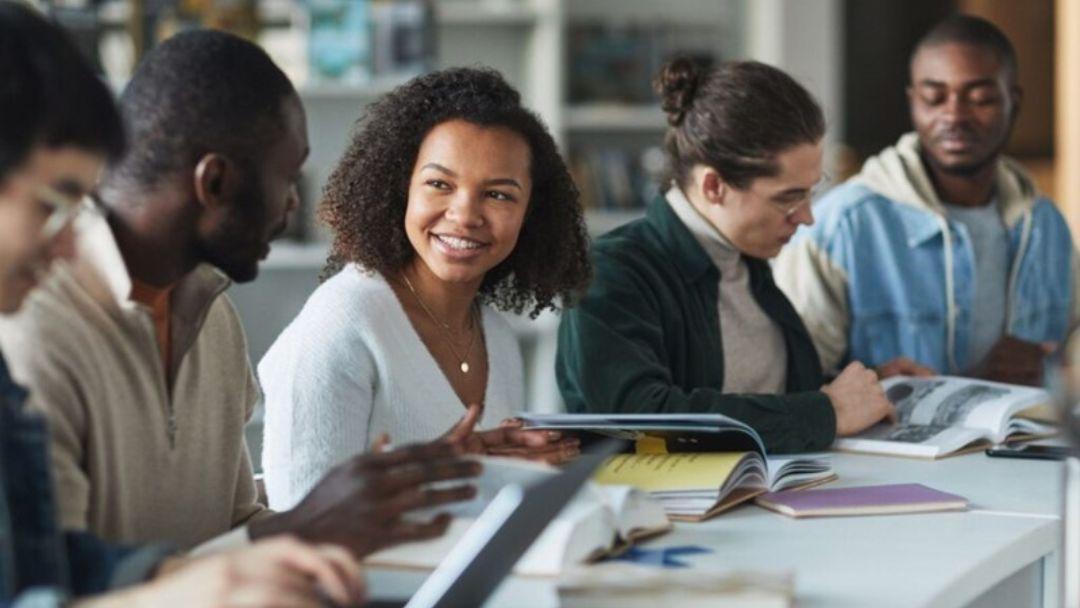 Diverse group of people talking at a table