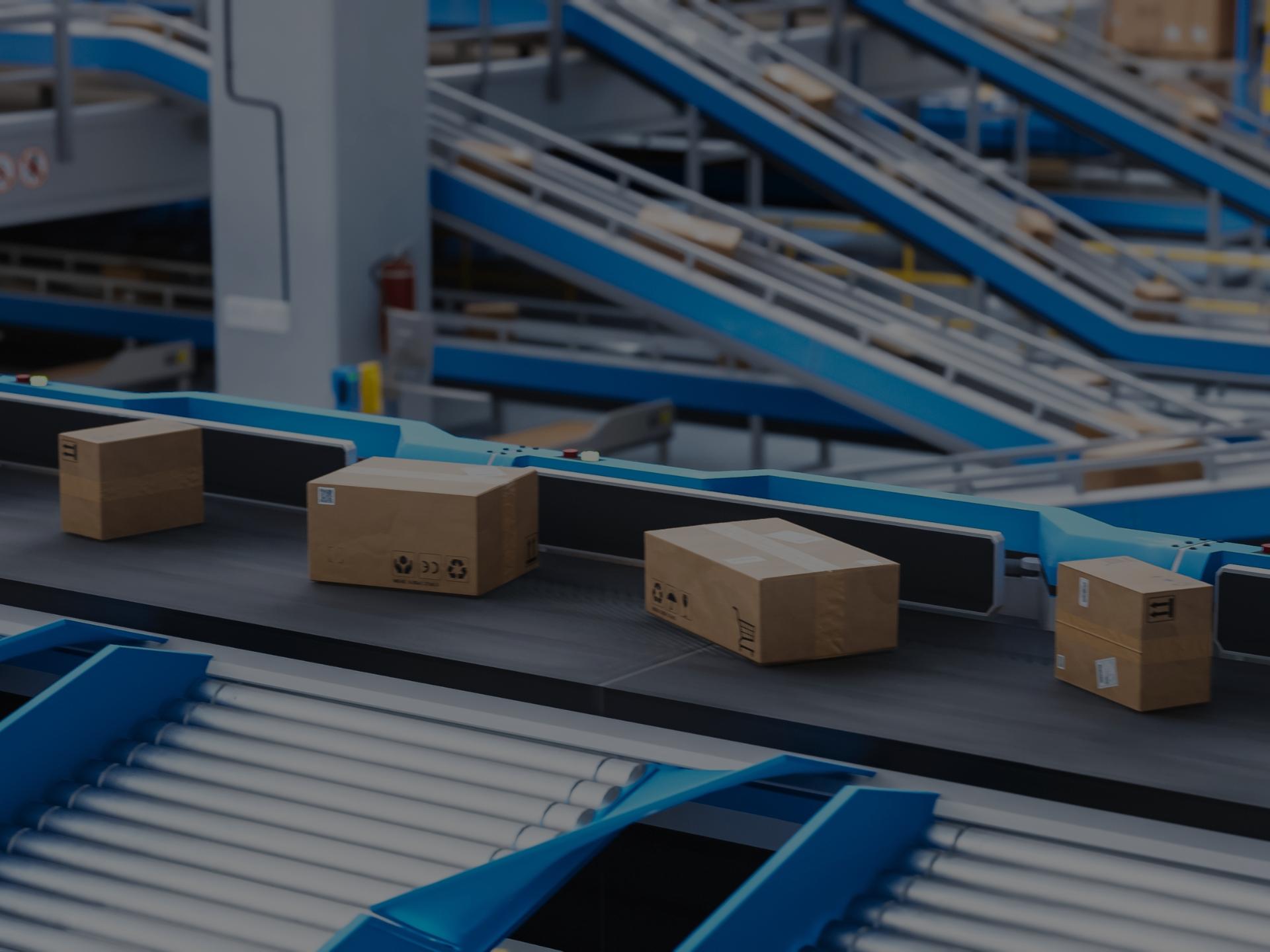 Boxes being processed through the conveyor belt of a distribution center. 