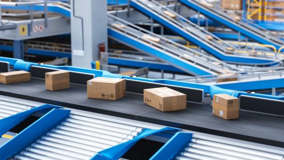 Boxes being processed through the conveyor belt of a distribution center. 